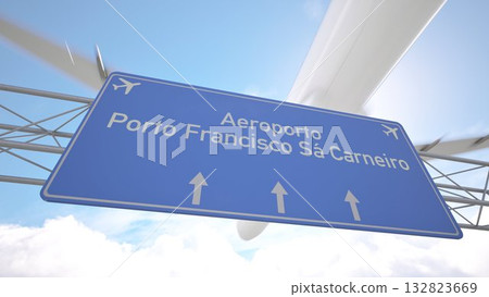 Realistic 3D render of blue sign near Porto Francisco Sa Carneiro Airport with commercial jet arriving from the horizon, arriving to Porto, Portugal. 3D rendering 132823669