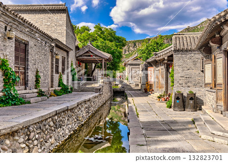 The ancient water town of Gubei near the site of the Great Wall of Simatai on a clear summer day. 132823701