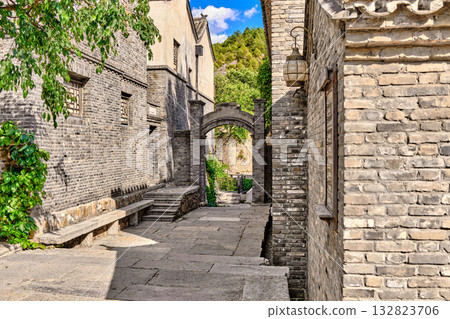 The ancient water town of Gubei near the site of the Great Wall of Simatai on a clear summer day. The ancient water town of Gubei near the site of the Great Wall of Simatai on a clear summer day. 132823706