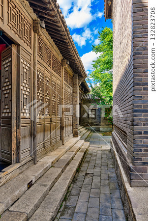 The ancient water town of Gubei near the site of the Great Wall of Simatai on a clear summer day. 132823708