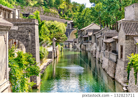 The ancient water town of Gubei near the site of the Great Wall of Simatai on a clear summer day. The ancient water town of Gubei near the site of the Great Wall of Simatai on a clear summer day. 132823711