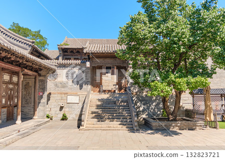 The ancient water town of Gubei near the site of the Great Wall of Simatai on a clear summer day. 132823721