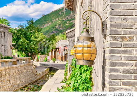 The ancient water town of Gubei near the site of the Great Wall of Simatai on a clear summer day. 132823725