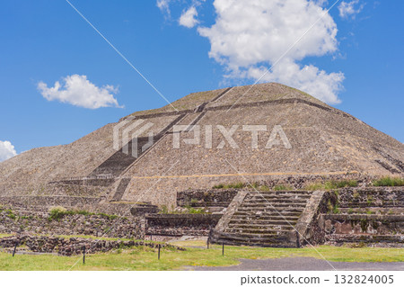 Teotihuacan in Mexico, showcasing iconic ancient pyramids and cultural heritage. Tourism, adventure, and historic exploration concept Teotihuacan in Mexico, showcasing iconic ancient pyramids and cultural heritage. Tourism, adventure, and historic exploration concept 132824005