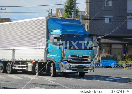 Image of a truck turning right at an intersection 132824399