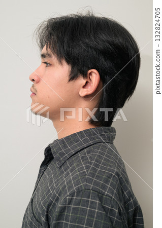 Portrait of handsome Young Asian Thai man face profile against white background 132824705