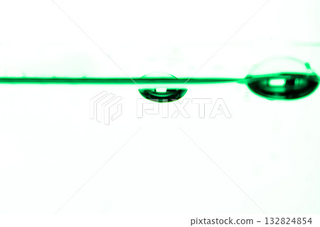 198.Green Liquid with Submerged Air Bubbles in Glass 132824854