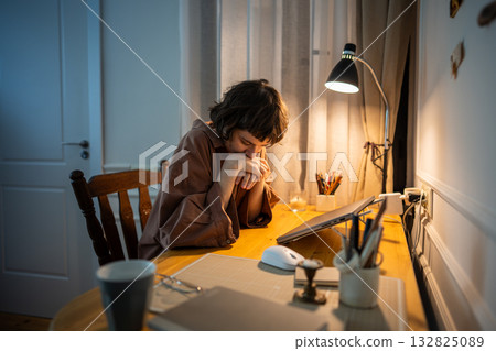 Weary woman rest head on palms after laptop work of late hour. Tired young student fatigue problem 132825089