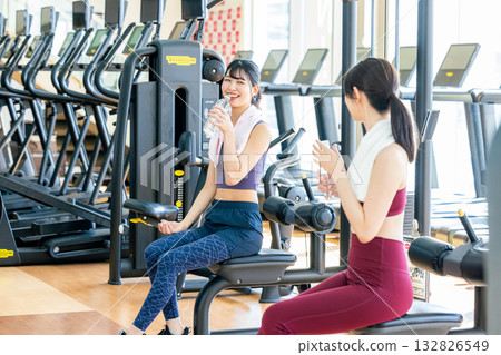 A young woman exercising at a sports gym 132826549