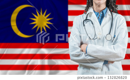 Medical professional on Malaysia flag. Healthcare and wellness in Malaysia, Concept 132826820