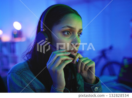 Talking woman, headphones or live streaming in neon home with esports ideas, pro gaming at night with anxiety. Player, headset or gamer microphone in night house with cyberpunk competition channel 132828534