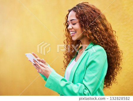 Woman, phone and typing on yellow background for communication, social media and tech chat. Happy female model, smartphone and network connection for mobile app, digital contact and search website Woman, phone and typing on yellow background for communication, social media and tech chat. Happy female model, smartphone and network connection for mobile app, digital contact and search website 132828582