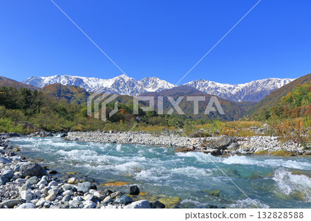 Hakuba Sanzan and three-tiered autumn foliage Hakuba Sanzan and three-tiered autumn foliage 132828588