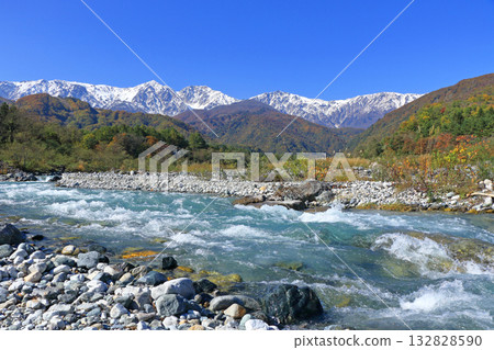 Hakuba Sanzan and three-tiered autumn foliage Hakuba Sanzan and three-tiered autumn foliage 132828590