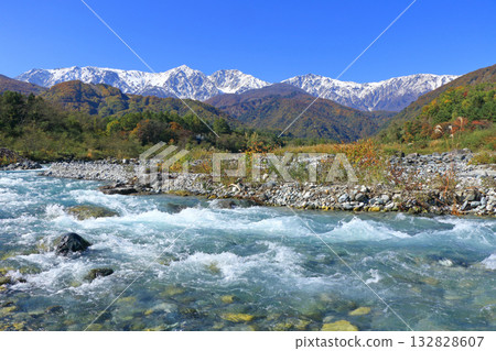 Hakuba Sanzan and three-tiered autumn foliage Hakuba Sanzan and three-tiered autumn foliage 132828607