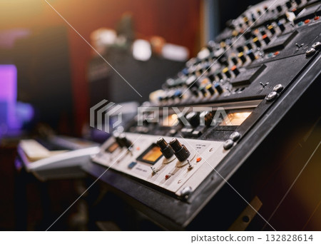 Sound board, music and production in recording studio with closeup, creativity and audio equipment. Mixing console, dj and technology with art, amplifier and produce song with entertainment Sound board, music and production in recording studio with closeup, creativity and audio equipment. Mixing console, dj and technology with art, amplifier and produce song with entertainment 132828614