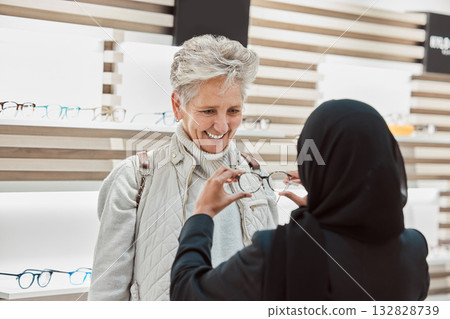 Glasses, vision and consulting with a senior woman in an optician office for prescription lenses. Eyewear, eyesight and fashion with a mature customer buying new frame spectacles at the optometrist 132828739