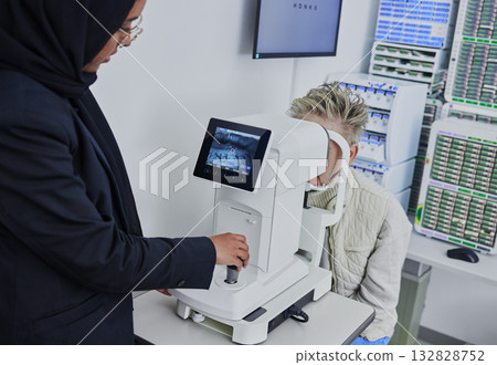 Optometry, screen for eye exam and optician with patient for vision test, eyesight and optical assessment. Healthcare, ophthalmology and optometrist with medical camera for eyes scan of senior woman 132828752