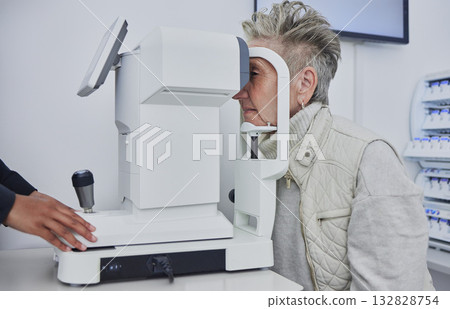 Eye exam, optometry and senior woman with test for medical, healthcare and vision wellness. Eyes consultation of elderly person with professional optometrist machine or technology for lens services Eye exam, optometry and senior woman with test for medical, healthcare and vision wellness. Eyes consultation of elderly person with professional optometrist machine or technology for lens services 132828754