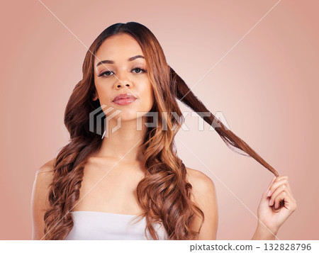Face portrait, hair care and beauty of woman in studio isolated on a pink background. Aesthetics, cosmetics and female model with salon treatment for balayage, growth and texture for curly hairstyle. 132828796