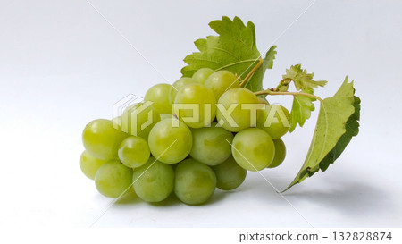 Fresh green grapes with leaves on white background 132828874