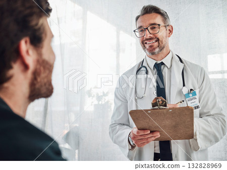 Senior doctor, patient data and results of a hospital worker in a cardiology consultation. Happiness, working and checklist clipboard of a wellness and health employee with a smile in a clinic 132828969