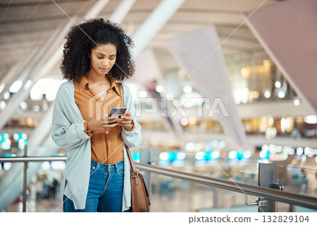 Travel, phone and search with black woman in airport for social media, relax and networking. Flight, departure and holiday with girl passenger browsing online for communication, vacation and contact 132829104
