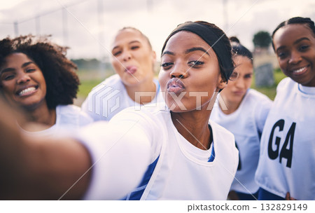 Netball, selfie and portrait of women students on a outdoor sports court for game or workout. Exercise, kiss face and athlete group together for sport, student wellness and teamwork for training Netball, selfie and portrait of women students on a outdoor sports court for game or workout. Exercise, kiss face and athlete group together for sport, student wellness and teamwork for training 132829149