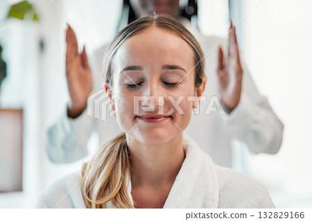 Relax, reiki and woman with smile on face at spa for spiritual chakra therapy and alternative medicine. Healing, balance and zen, person with peaceful mindset and healthy mind at traditional massage. Relax, reiki and woman with smile on face at spa for spiritual chakra therapy and alternative medicine. Healing, balance and zen, person with peaceful mindset and healthy mind at traditional massage. 132829166