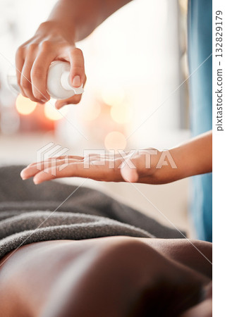Hands, oil spray and back massage with masseuse, women at holistic center or spa with wellness, physical therapy and zen. Health, peace of mind and stress relief, self care and lifestyle with healing Hands, oil spray and back massage with masseuse, women at holistic center or spa with wellness, physical therapy and zen. Health, peace of mind and stress relief, self care and lifestyle with healing 132829179