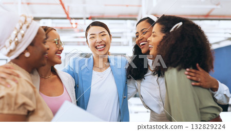 Hug, team building or happy business women in celebration of goal, group mission or funding for startup. Partnership, smile or excited people in huddle for winning, motivation or solidarity together 132829224