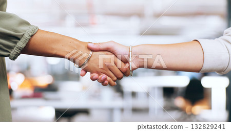 Closeup, agreement or b2b handshake of business people for professional partnership together. Corporate, success or women employees shaking hands in workplace office for a deal, teamwork or welcome 132829241