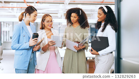 Diverse team, tablet and discussion in office, strategy and documents for agenda, analysis and design. Business women, working and digital on tech, support and meeting and teamwork in collaboration 132829263