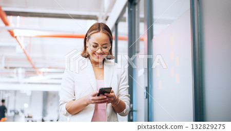Business, smile and woman with a smartphone, typing and connection with employee, mobile user and search internet. Person, entrepreneur and consultant with a cellphone, website info and social media 132829275