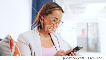 Business, happy and woman with a cellphone, typing and connection with employee, email notification and website info. Person, worker and consultant with a smartphone, digital app and social media 132829276