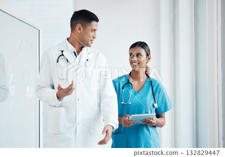 Doctor, nurse and professionals walking, talking and planning healthcare surgery in a hospital together as medical experts. Medicine, tablet and colleagues in discussion as a team working in a clinic Doctor, nurse and professionals walking, talking and planning healthcare surgery in a hospital together as medical experts. Medicine, tablet and colleagues in discussion as a team working in a clinic 132829447