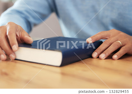 Religion, christian and hands with a bible for education, prayer and hope. Peace, worship and man ready to start learning about Jesus, the church and God by studying a holy book for support and faith 132829455