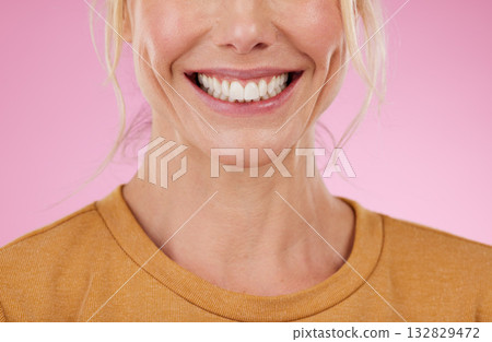 Teeth whitening, mouth and woman in studio, pink background and backdrop. Happy female model, lips and smile for dental wellness, tooth implant and aesthetic facial of beauty, health or face skincare Teeth whitening, mouth and woman in studio, pink background and backdrop. Happy female model, lips and smile for dental wellness, tooth implant and aesthetic facial of beauty, health or face skincare 132829472