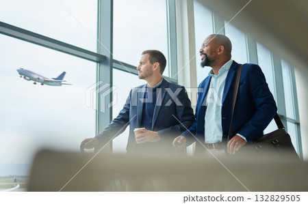 Travel for business, team of men at airport for flight, conversation with conference or seminar. Diversity, partnership and looking out of window, professional trip for architecture convention Travel for business, team of men at airport for flight, conversation with conference or seminar. Diversity, partnership and looking out of window, professional trip for architecture convention 132829505