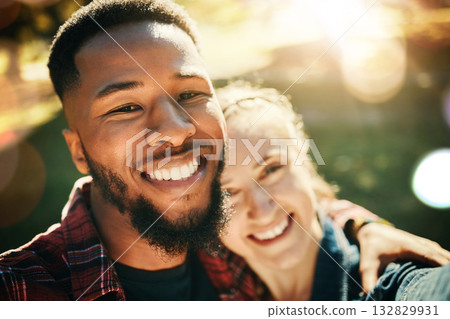Couple, love selfie and portrait smile at park outdoors, enjoying fun time and bonding together. Diversity, romance and face of black man and woman taking pictures for happy memory or social media. 132829931
