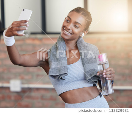 Woman, fitness and smile for selfie or profile picture in exercise, workout or training at the gym. Happy female smiling with water bottle for photo, memory or social media post in healthy wellness Woman, fitness and smile for selfie or profile picture in exercise, workout or training at the gym. Happy female smiling with water bottle for photo, memory or social media post in healthy wellness 132829981