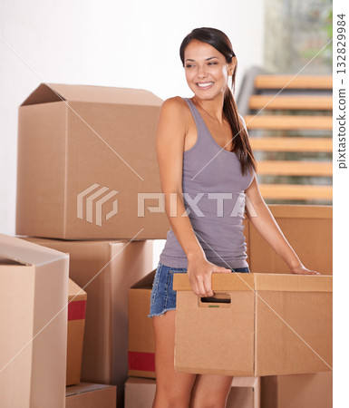 Smile, young woman and packing boxes for new home owner or parcels for logistics and client moving house. Freight, cargo and lady at property with a package from a courier or shipping for real estate Smile, young woman and packing boxes for new home owner or parcels for logistics and client moving house. Freight, cargo and lady at property with a package from a courier or shipping for real estate 132829984