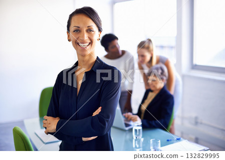 Portrait, corporate and woman with arms crossed, happy and startup with management, teamwork or profit growth. Face, female leader or employee with staff, group or planning in the office and workshop 132829995