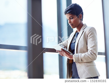 Tablet, mockup and research with a business woman leaning against a glass wall or window at the office. Technology, corporate and space with a young professional female employee working online Tablet, mockup and research with a business woman leaning against a glass wall or window at the office. Technology, corporate and space with a young professional female employee working online 132830101