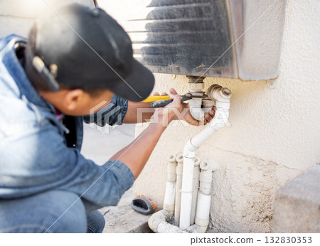 Man, plumber and wrench for water pipes of building maintenance, renovation and builder service. Handyman, pipeline and plumbing tools for leak, drainage and installation of system, sink and repair 132830353
