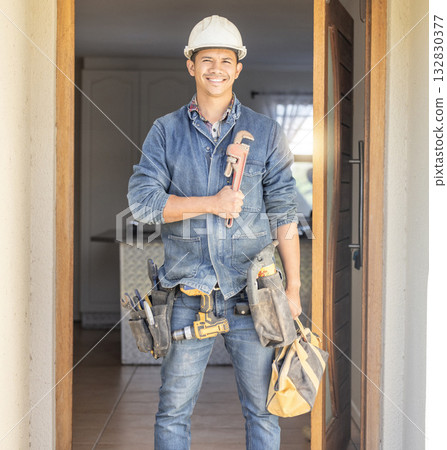 Handyman smile in portrait, maintenance and tools with construction and home renovation with builder. Professional, contractor and DIY skills, architecture and wrench, male with helmet for safety Handyman smile in portrait, maintenance and tools with construction and home renovation with builder. Professional, contractor and DIY skills, architecture and wrench, male with helmet for safety 132830377