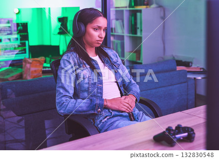 Woman, headphones or gaming loss in neon home with bored, tired or annoyed face expression in PC esports challenge. Video gamer, console or loser in night house basement with fail, mistake or burnout Woman, headphones or gaming loss in neon home with bored, tired or annoyed face expression in PC esports challenge. Video gamer, console or loser in night house basement with fail, mistake or burnout 132830548