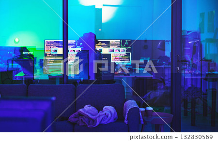 Hacker, back or computer screen in neon programming, cybersecurity ransomware or SEO night phishing in basement. Programmer, developer or woman on technology coding for dark software, iot bug or scam 132830569