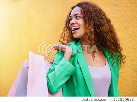 Shopping bag, fashion and black woman isolated on wall background with idea, vision and wealth success for sale. Retail, outdoor and funky model or young customer person walking with discount clothes Shopping bag, fashion and black woman isolated on wall background with idea, vision and wealth success for sale. Retail, outdoor and funky model or young customer person walking with discount clothes 132830658