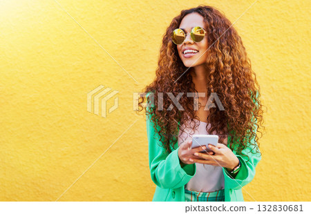 Fashion, phone and black woman isolated on wall background for social media, blog or creative ideas mockup. Funky model or thinking person on mobile app or smartphone with designer summer clothes Fashion, phone and black woman isolated on wall background for social media, blog or creative ideas mockup. Funky model or thinking person on mobile app or smartphone with designer summer clothes 132830681